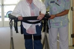 Older woman using the Gait Harness System