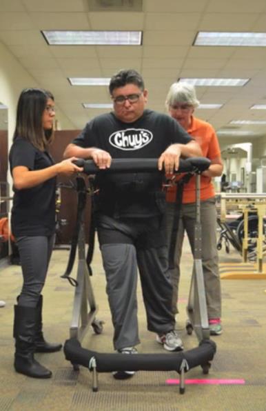 Gait Harness System user walking again in clinic