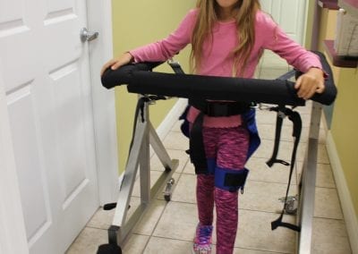 Child using the Pediatric Gait Harness System