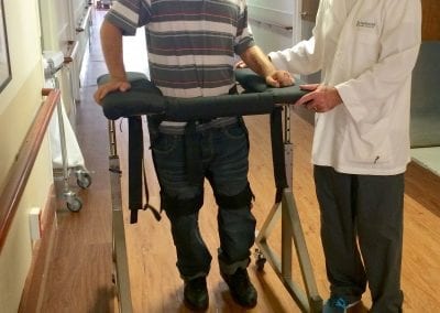 Man using the Gait Harness System in clinic
