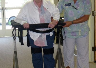 Elderly woman using the Gait Harness System